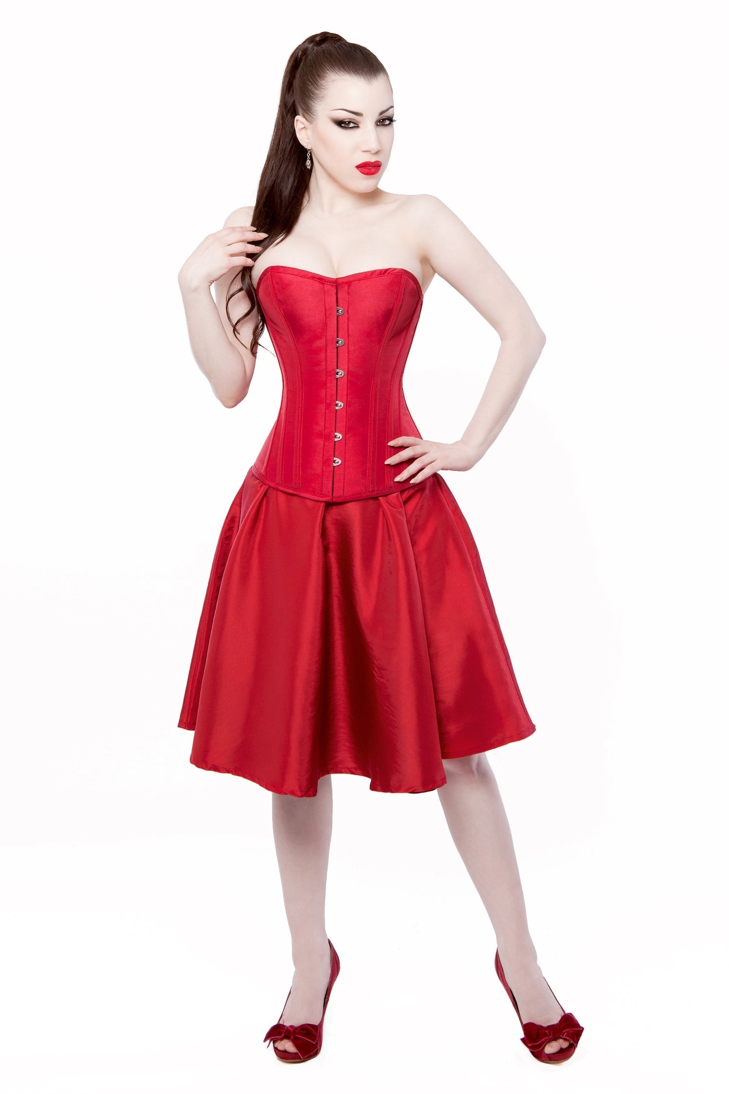 Die Dame im roten Korsettkleid